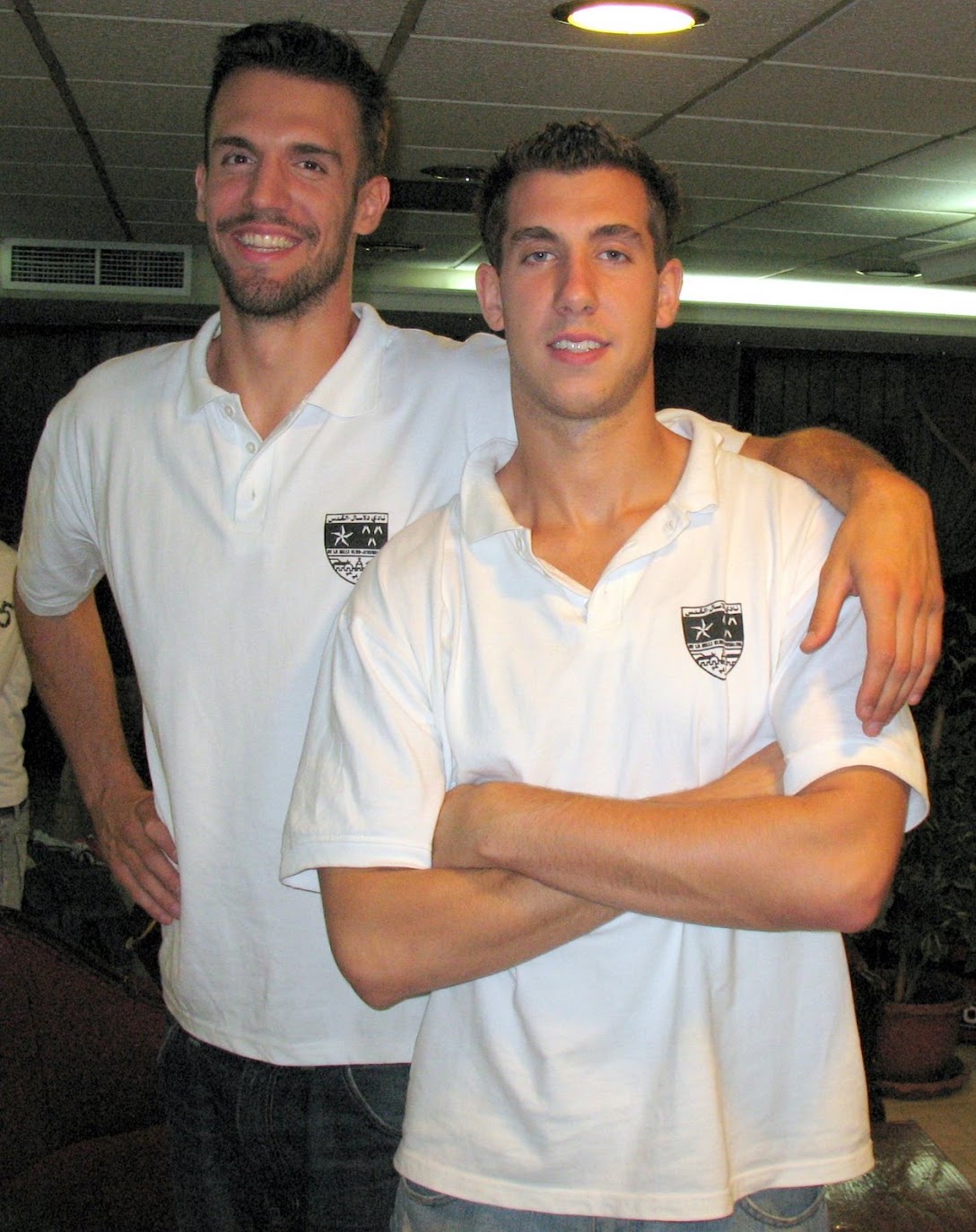 Brian Sigafoos and Mike V-C in white De La Salle shirts before playing in Jeddah